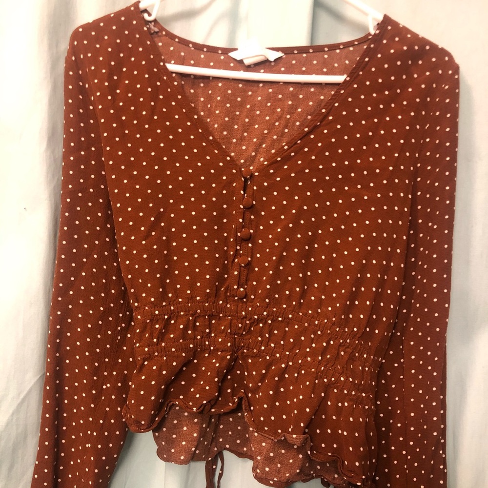 Rust colored polka dot blouse